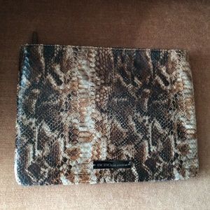 BCBG “snake” clutch